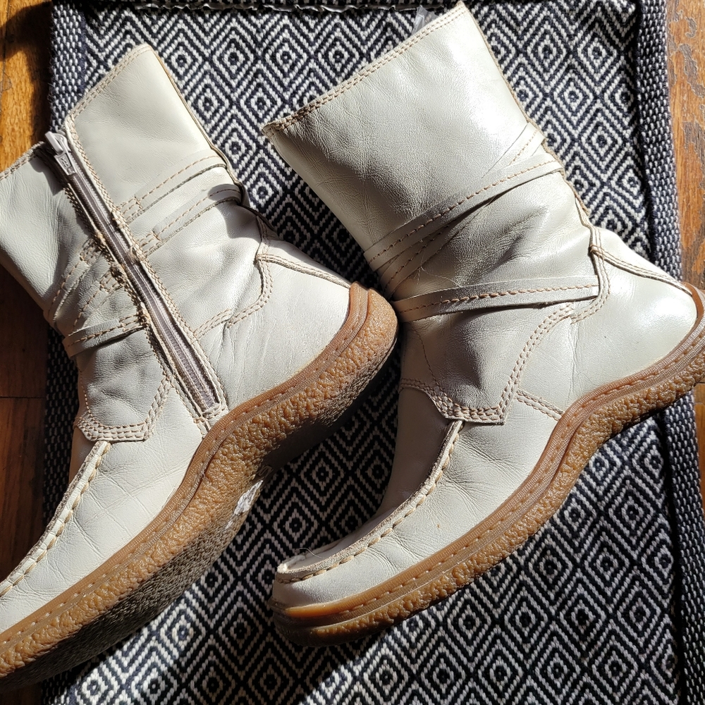 Cream boots with criss cross detail